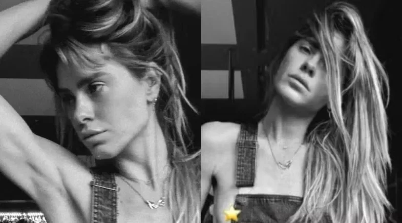Carolina Dieckmann posa de jardineira; estrela cobre seio