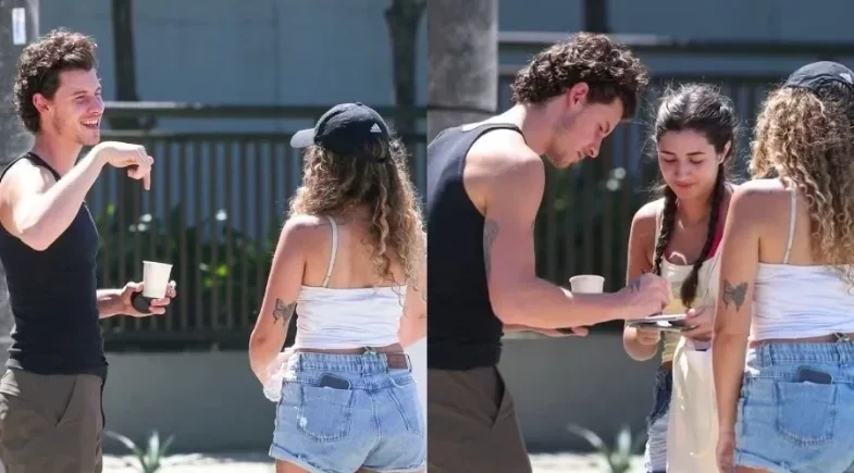 Shawn Mendes circula sem seguranças e dá autógrafos na orla